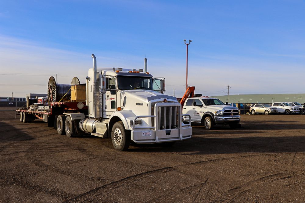 Oilfield-Hauling.jpg. Trucking, Picker & Hotshot Services